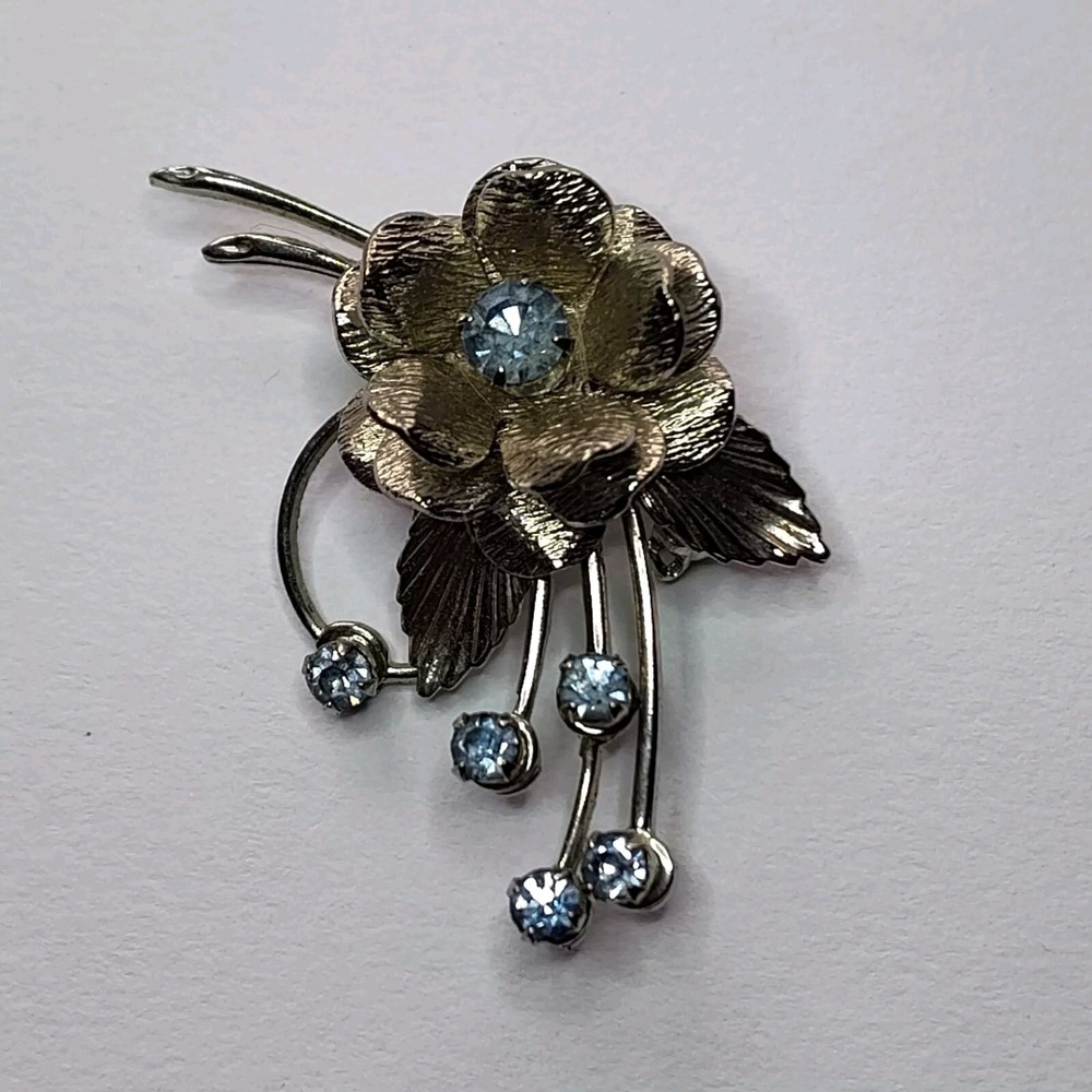 Vintage silver toned brooch with blue stones costume fashion statement